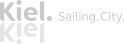 Logo der Kiel Sailing City mit stilisiertem Schriftzug in weiß auf transparentem Hintergrund.